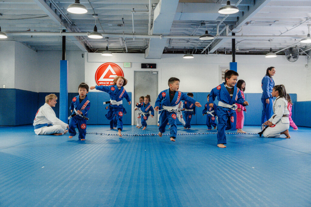 Kids training in bjj teacher self-defense